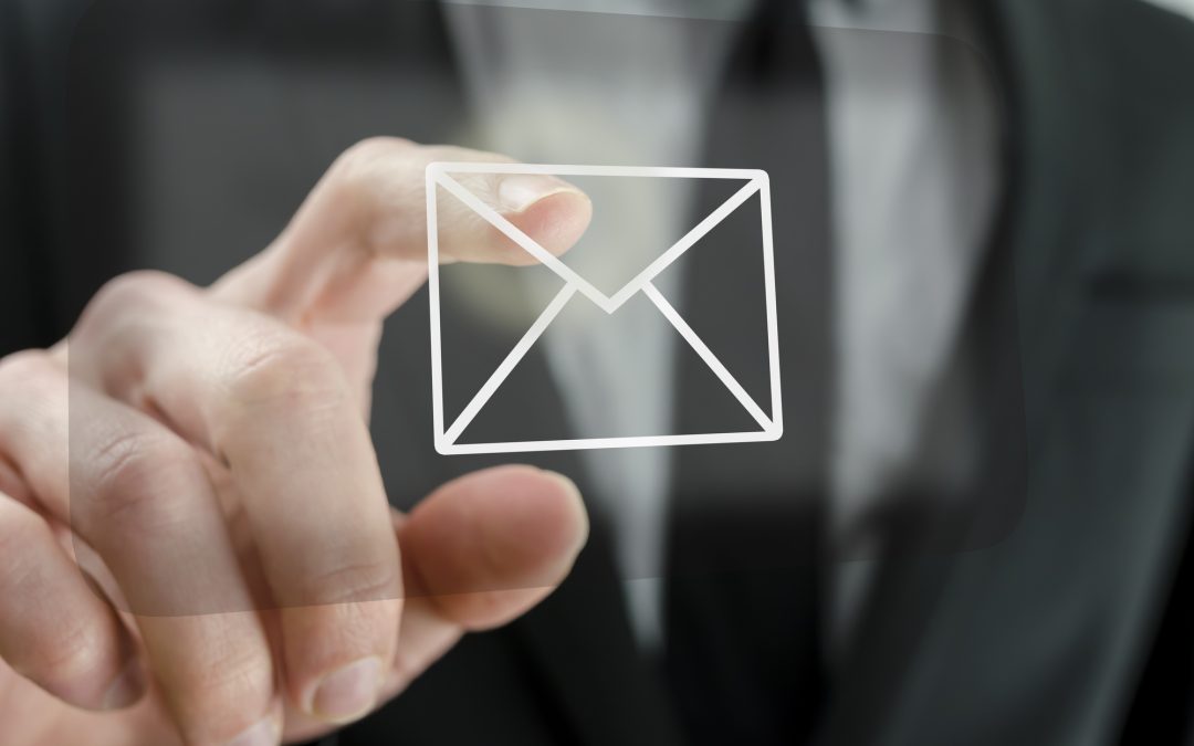 Businessman touching email icon
