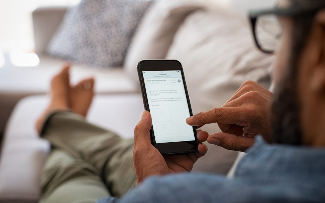 Man reading email on smartphone